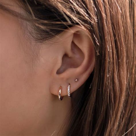 Tiny Huggie Hoop Earrings In 2021 Earings Piercings Cool Ear
