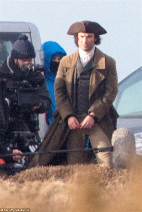 shackled aidan turner reprised his role as ross poldark this week as he was filmed in handcuffs