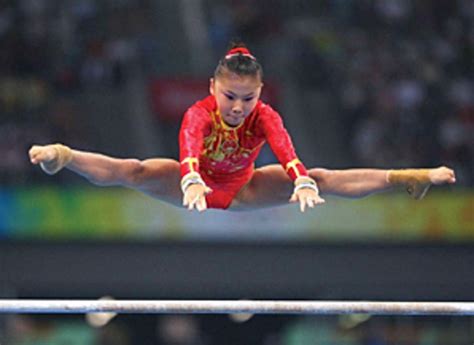 Chinese News Service Cited Gymnast As 13 Sports Illustrated