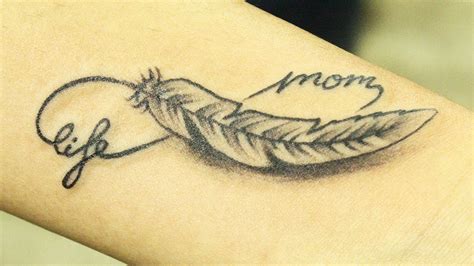 Buy cheap borescope online from china today! Beautiful Infinity Feather Tattoo with Lettering Design ...
