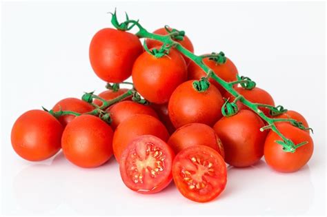 Free Photo Round Tomatoes On Top Of Each Other On White