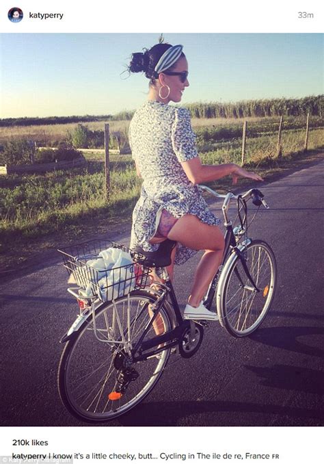 Katy Perry Flashes Her Derriere In Saucy Cycling Photo Daily Mail Online