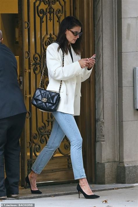 Katie Holmes Cuts A Chic Figure In White Blazer With Fitted Denim As