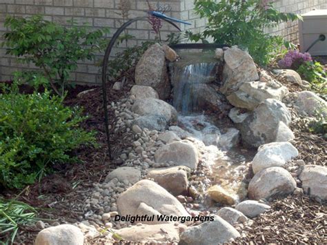 Here is another double bubbler backyard fountain from 'scattered thoughts of a crafty mom'. Diy backyard waterfall | Outdoor furniture Design and Ideas