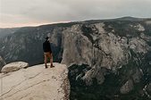 "Man Standing At The Edge Of A Mountain Cliff In Yosemite" by Stocksy ...