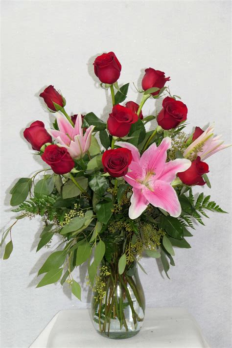 Dozen Red Roses With Stargazer Lillies In Fresno Ca D And L Floral