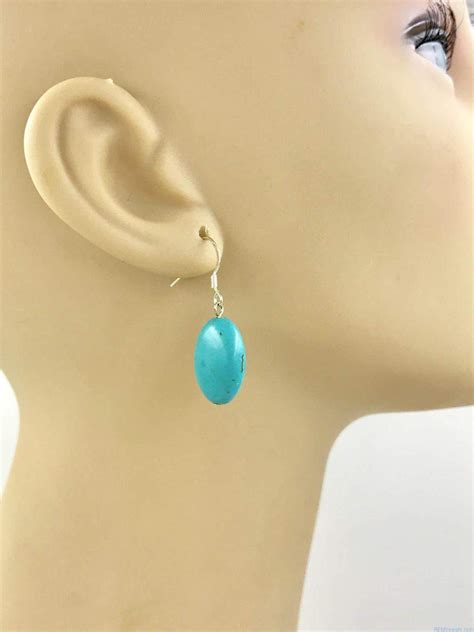 Sterling Silver Turquoise Dangle Earrings Signed Remijewels