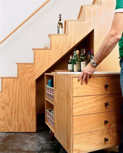 Furniture Utilize Small Spaces Under Stairs For Wine Storage And