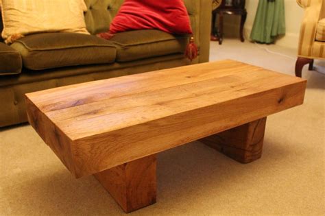 A custom made rustic coffee table is often called the anchor of the living room.the classic low table can pull a space together and set the tone that incorporates all the other furniture elements. Coffee table solid French oak beam handmade side rustic ...