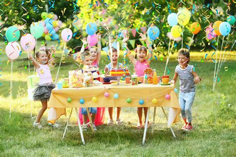 Happy Children Celebrating Birthday Park — Stock Photo © Belchonock