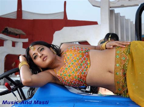 Music And Masti Anushka Navel Show In Yellow