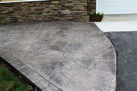 Seamless Stamped Concrete Patio With Hand Tooled Border And Porch With