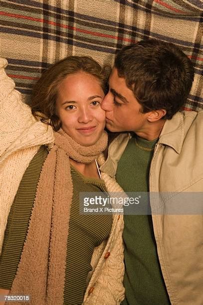 Brunette Girl Kissing Beach Photos Et Images De Collection Getty Images