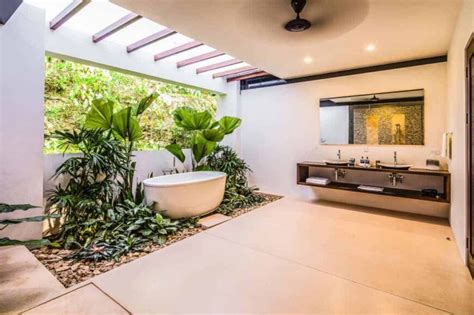 20 Tantalizing Tropical Style Primary Bathroom Inspirations