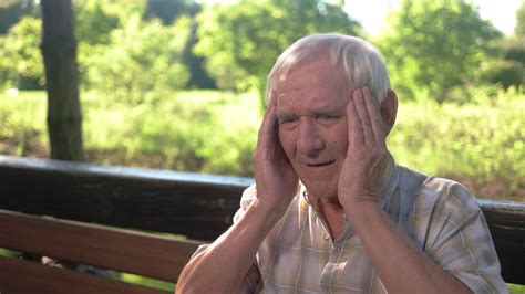 Old Man Holding Head Elderly Person Has Stock Footage Sbv 313592084 Storyblocks