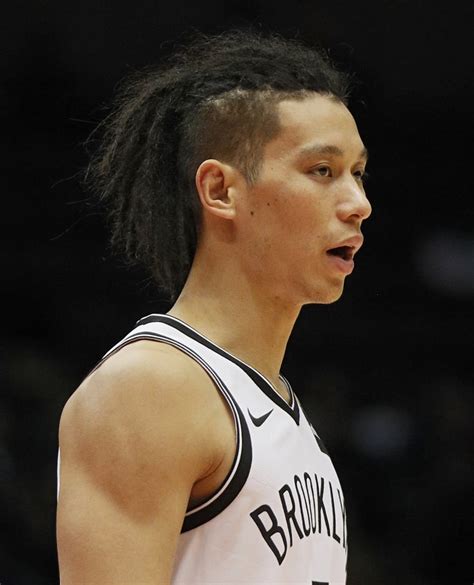5of14charlotte hornets' jeremy lin reacts after a basket against the toronto raptors during the second half of an nba basketball game in jeremy, what exactly are you doing with your hair? Jeremy Lin | Best Celebrity Hair of 2017 | POPSUGAR Beauty Photo 2