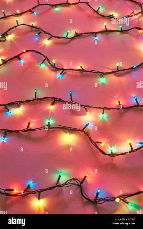 Background Of Colorful Christmas Lights Decorative Garland Stock Photo