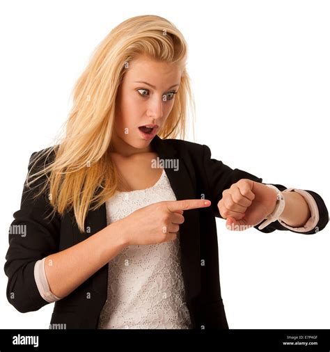Young Blonde Woman Looks At Her Watch When She Is Being Late Isolated