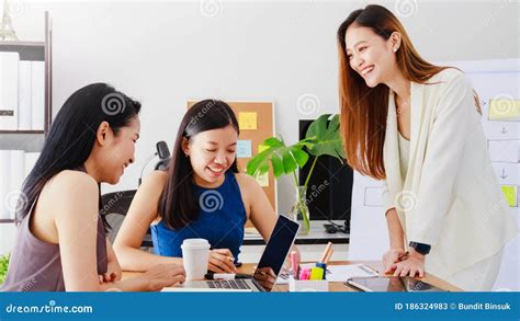 Group Of Beautiful Asian Women Meeting In Office To Discussion Or