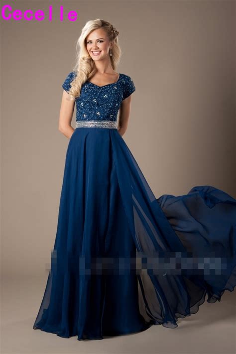 2018 Blue Lace Chiffon Modest Prom Dresses With Cap Sleeves Beaded Sexy