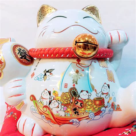 Chuyên mua bán và gia công các loại vàng bạc, đá quý. Mèo thần tài-Thuyền chở đầy vàng 9050-19cm, Mèo Maneki ...