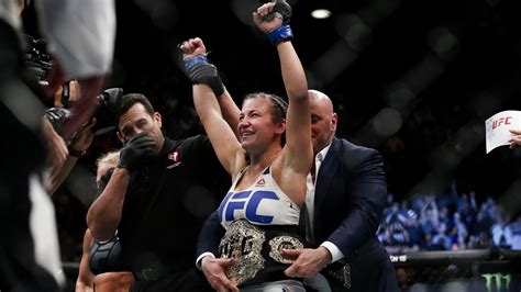 Ufc 196 Results Miesha Tate Stuns Holly Holm With Fifth Round