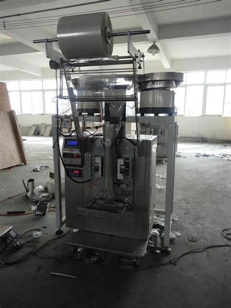 Full Automatic Screw Weighing Packaging Machine Dxd Slc China Hardware Weighing Packing