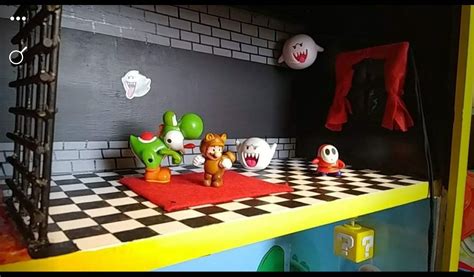 Some Toys Are Sitting On Top Of A Counter In A Playroom With Black And