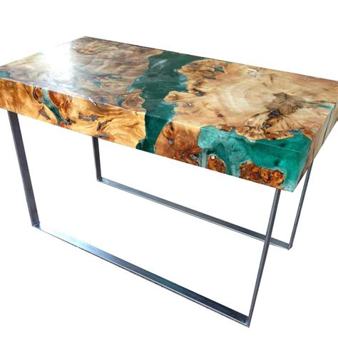 Check spelling or type a new query. Resin and wood coffee table, welded steel legs. | Resin ...