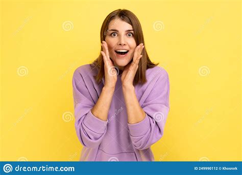 Excited Amazed Woman Touching Face And Shouting In Surprise Shocked By