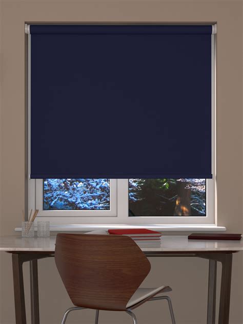 Should you opt for light filtering blinds or blackout shades? Navy Blackout Roller Blind | Blinds Direct Online