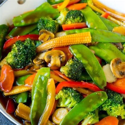 Stir Fry Vegetables Are Mixed Together In A Wok On The Stove Top Ready To Be Eaten