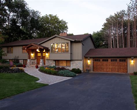 A manicured lawn with flowers and plants framing the steps going up the covered front door. Back-To-Front Split Level Addition Home Design Ideas ...