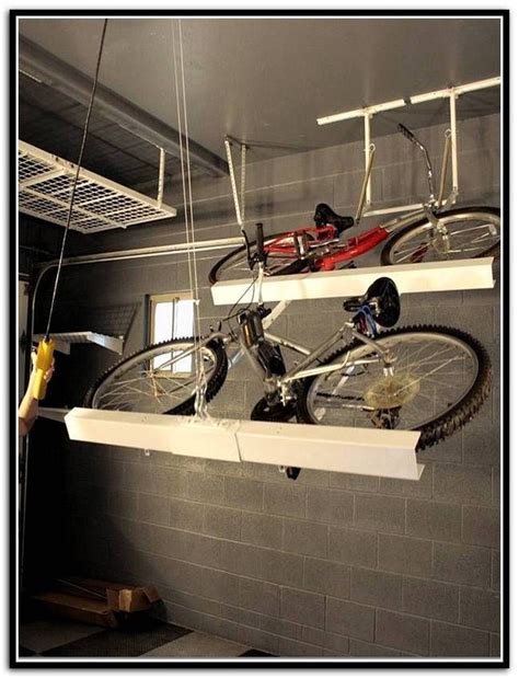 Previously the garage had giant, sliding barn doors that didn't work anymore. Garage Ceiling Bike Storage | Bike storage garage ceiling ...