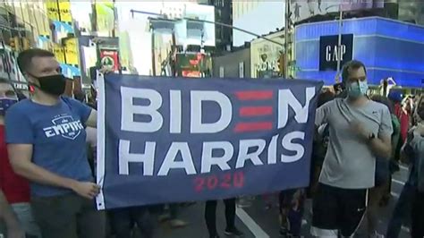 Crowds Gather In Times Square After Biden Projected To Win Election