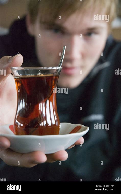 Turkish Tea Served In A Traditional Tulip Shaped Glass With Suacer And