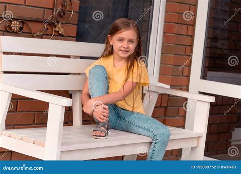 Happy Beautiful Little Girl With Long Blonde Hair Wearing Casual
