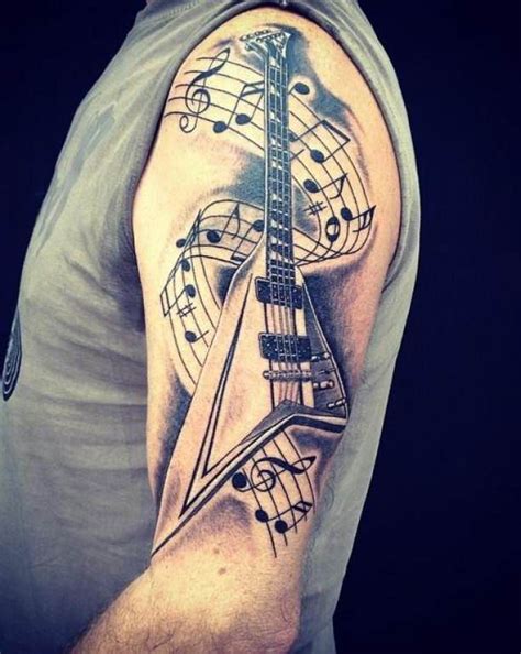 Tattoo E Guitar With Notes Ideas Tattoo Designs Metal Tattoo Music