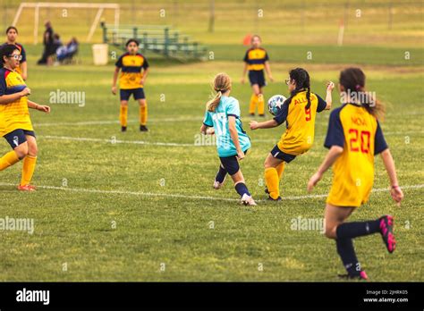 The Young Girls Playing Soccer At Youth Soccer Game Stock Photo Alamy