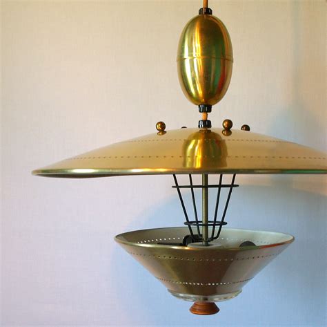 A rare ceiling light designed by paavo tynell & manufactured by taito oy in finland 1946. UFO PENDANT LIGHTING Vintage Atomic Flying Saucer Pull ...