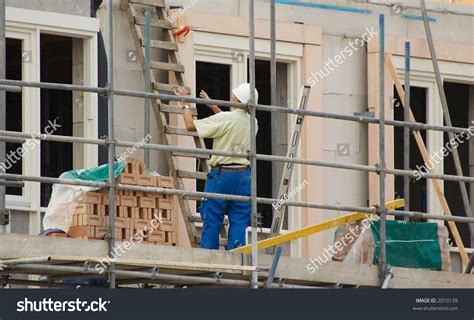 Construction Workers Building A House Stock Photo 2010139 Shutterstock