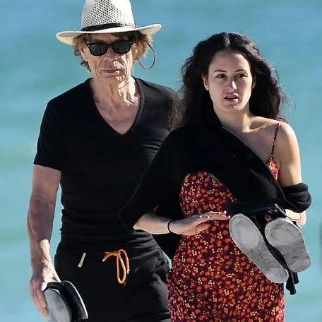 Mick Jagger And His Year Melanie Hamrick Caught On The Beach