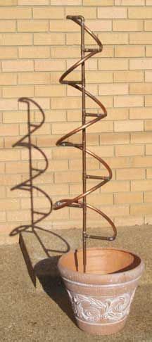 With so many fun and innovative tomato trellis ideas for your garden, choosing the right one for your needs can be tough. Copper Spiral Trellis Assembly | Garden art diy, Garden ...