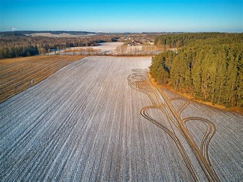 Premium Photo Winter Agricultural Field Under Snow Aerial Scene