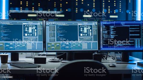 We do about 2000 returns per year. Shot Of Multiple Personal Computer Monitors Showing Coding ...