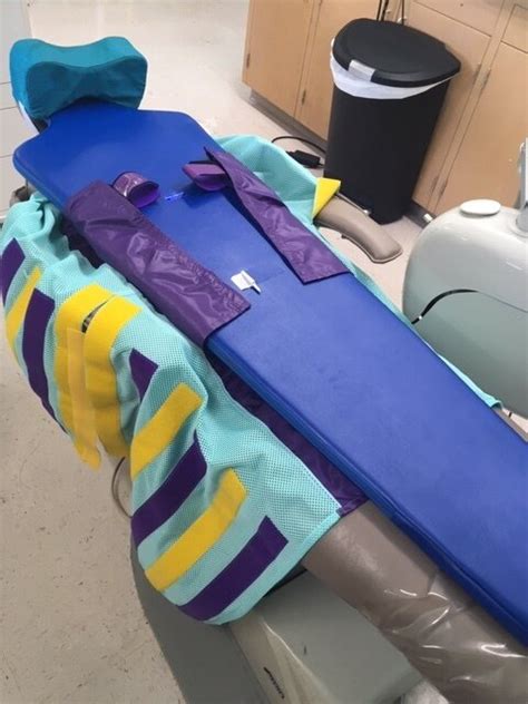 In Dental Care For Severe Autism A Papoose Board Comes To The Rescue