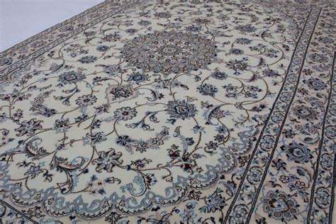 Persia (iran) • knot density is 1,000.000 knots/m². Nain Teppich Beige Blau in 250x160 (5120-26657) - carpetido.de