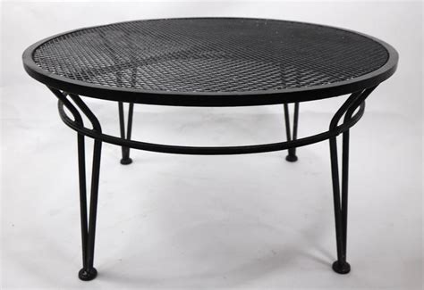 Wrought iron patio, garden table having a metal mesh top, on waisted from wrought iron base. Wrought Iron Salterini Garden Patio Coffee Cocktail Table ...