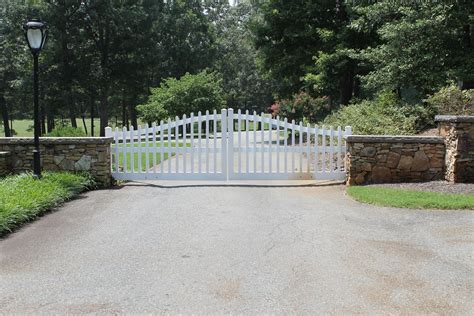Best double gate designs in india: Double swing gate entrance to a residential gated ...