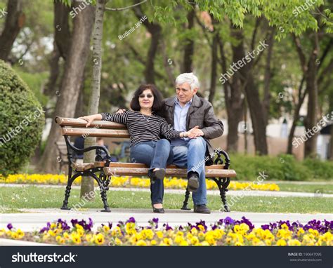 Older Couple Hug Sitting On Bench Stock Photo Shutterstock